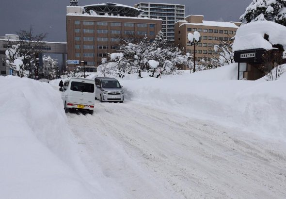 AFP__20260203__94WE2AB__v2__HighRes__JapanWeatherSnow