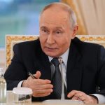 Russian President Vladimir Putin meets with representatives of international news agencies on the sidelines of the St. Petersburg International Economic Forum