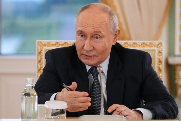 Russian President Vladimir Putin meets with representatives of international news agencies on the sidelines of the St. Petersburg International Economic Forum