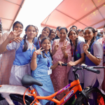delhi cm rekha gupta distributes vidya vahini bicycles to class 9 girls 140000 cycle scheme